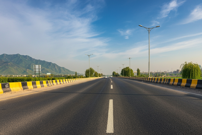 Do Darya Road in Karachi, Pakistan, with the Arabian Sea in the background.