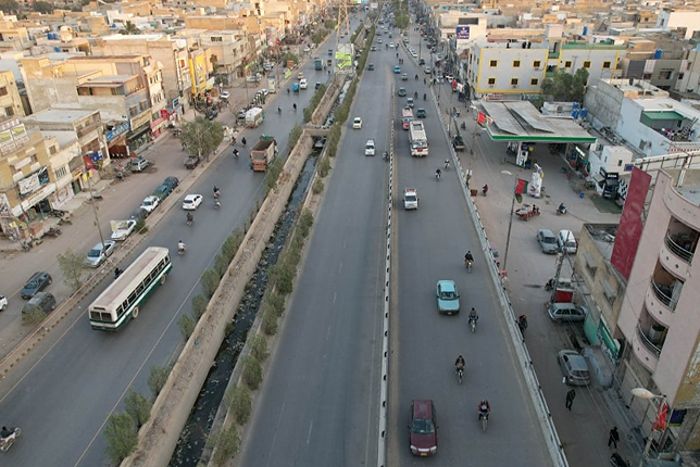 An aerial view of Buffer Zone, North Karachi, showcasing residential houses and a nearby market area