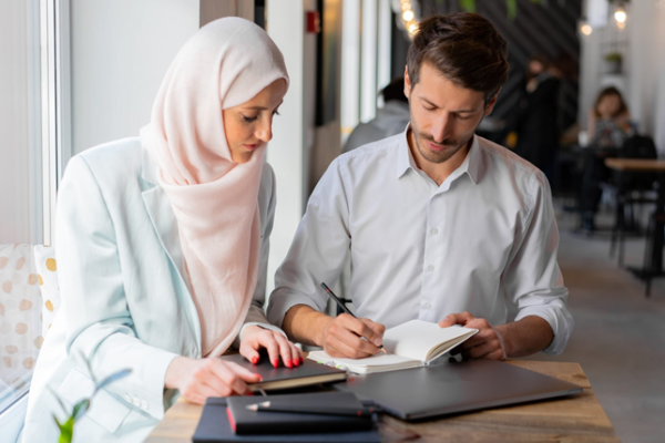 A family reviewing property documents together at home.